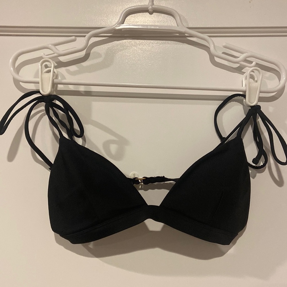 Black shoulder tie bikini top. Comes with pads. Good condition.
